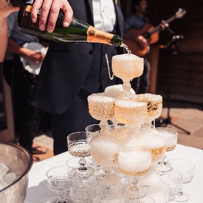 Surprise guests with a champagne tower!