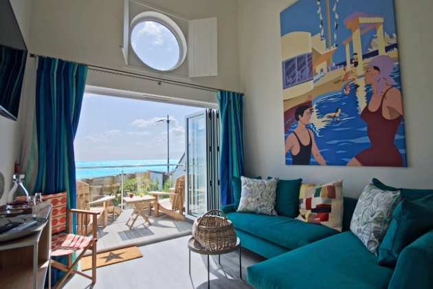 Looking out to coast from inside a Beach Hut Suite at The Beachcroft, West Sussex