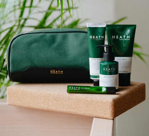 Products and washbag in green from Heath on a table