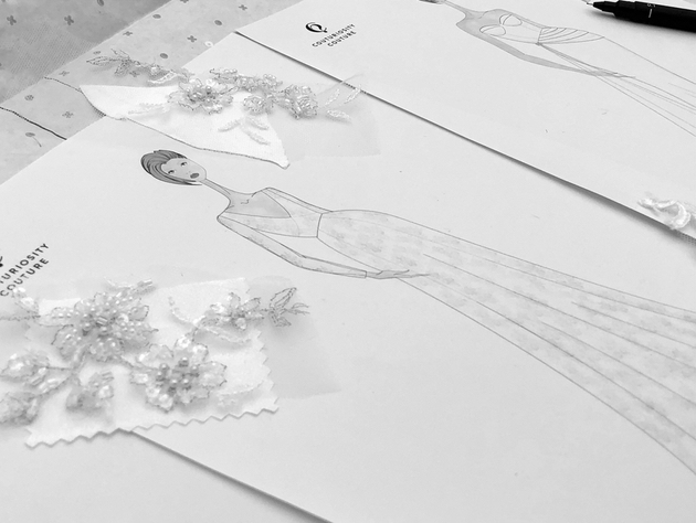 Black and white image of wedding dress design sketch