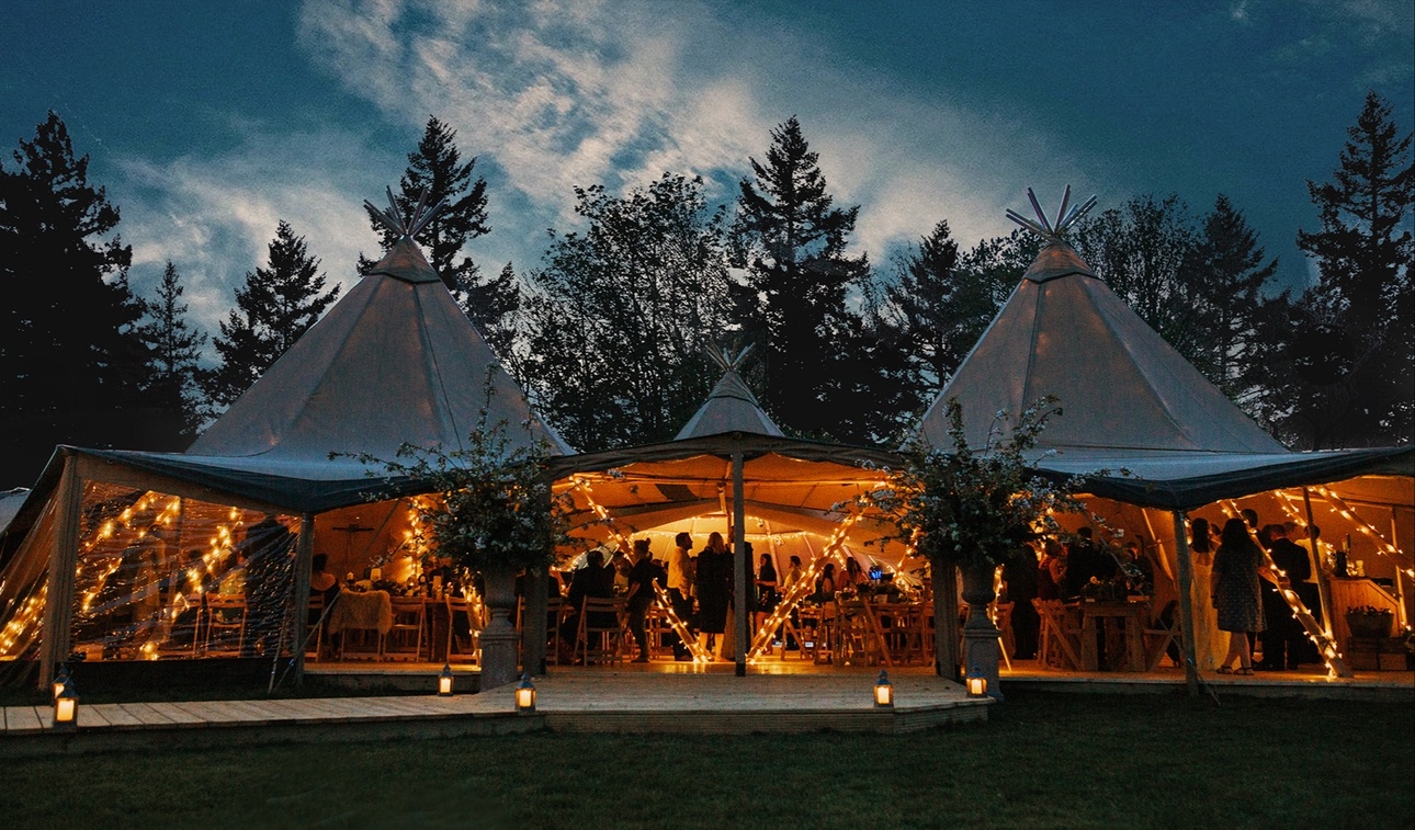 Tipi set up for wedding with fairylights.