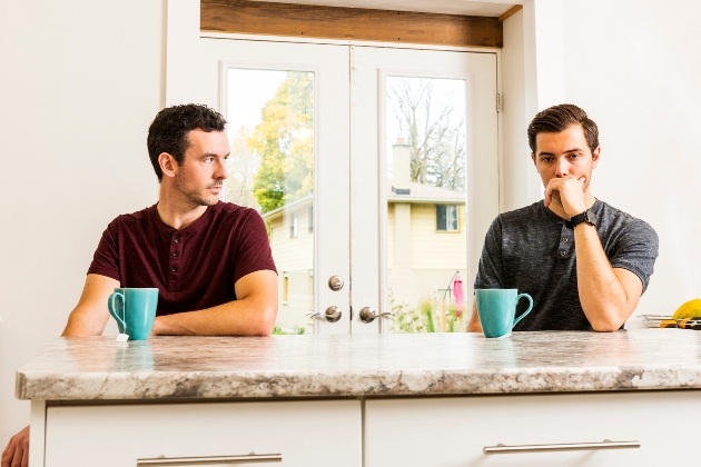 couple after row at kitchen table