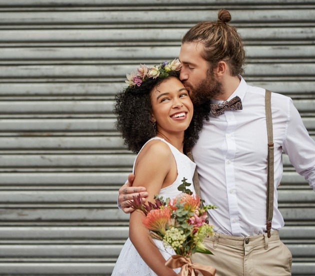 Happy couple having micro wedding