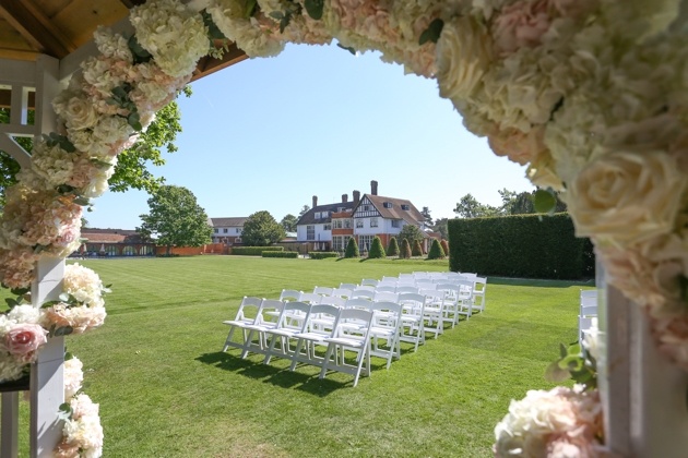 Exterior view of outdoor ceremony area at Greenwoods wedding venue in Essex