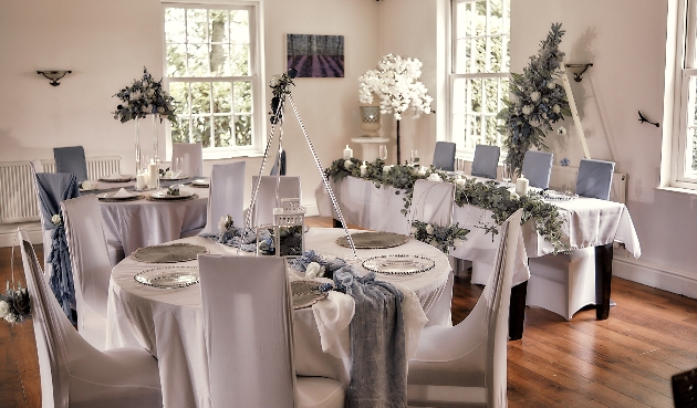 Wedding reception layout with dusky blue palette