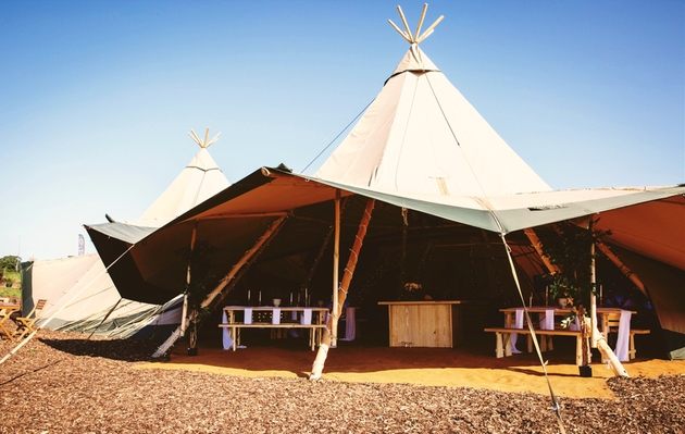Tipi set up for an outdoor wedding.