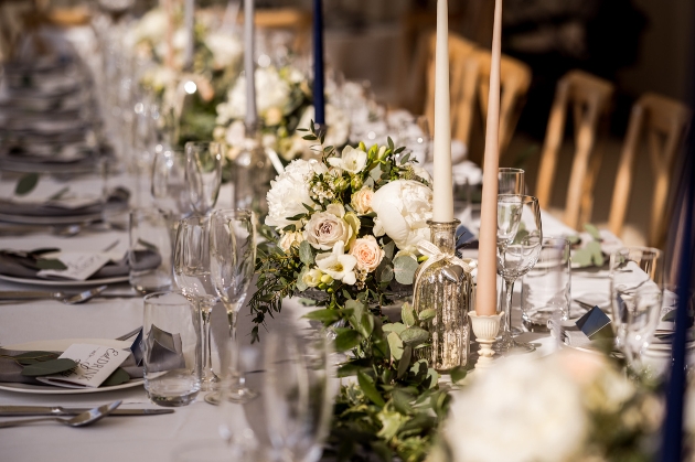 table flower display running through centre of table