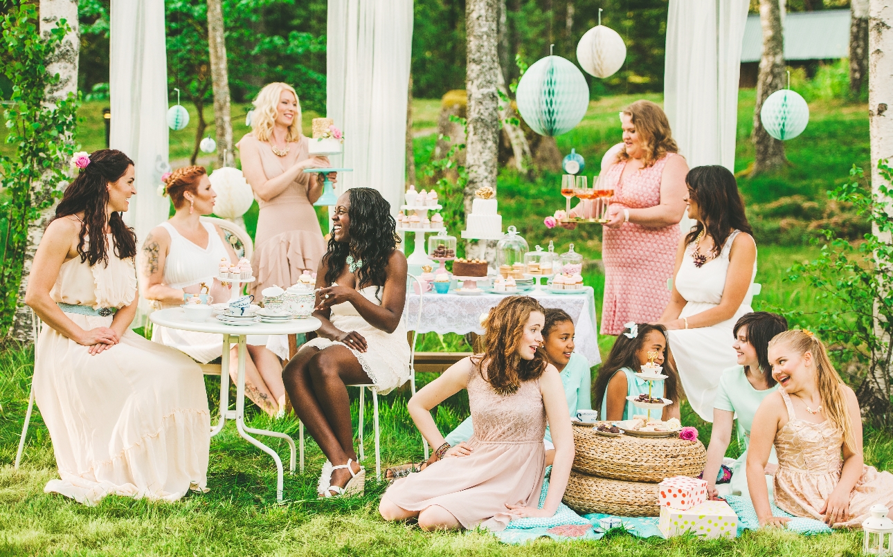 group of women at an outdoor hen do tea party 