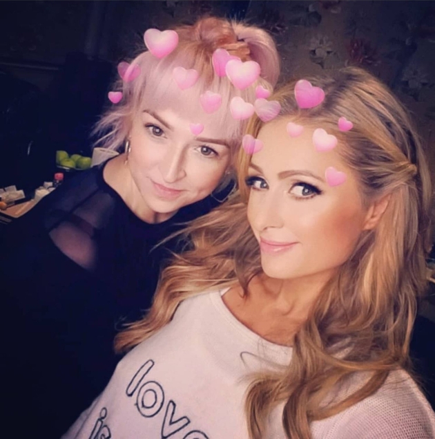 makeup artist Ivory standing with Paris Hilton