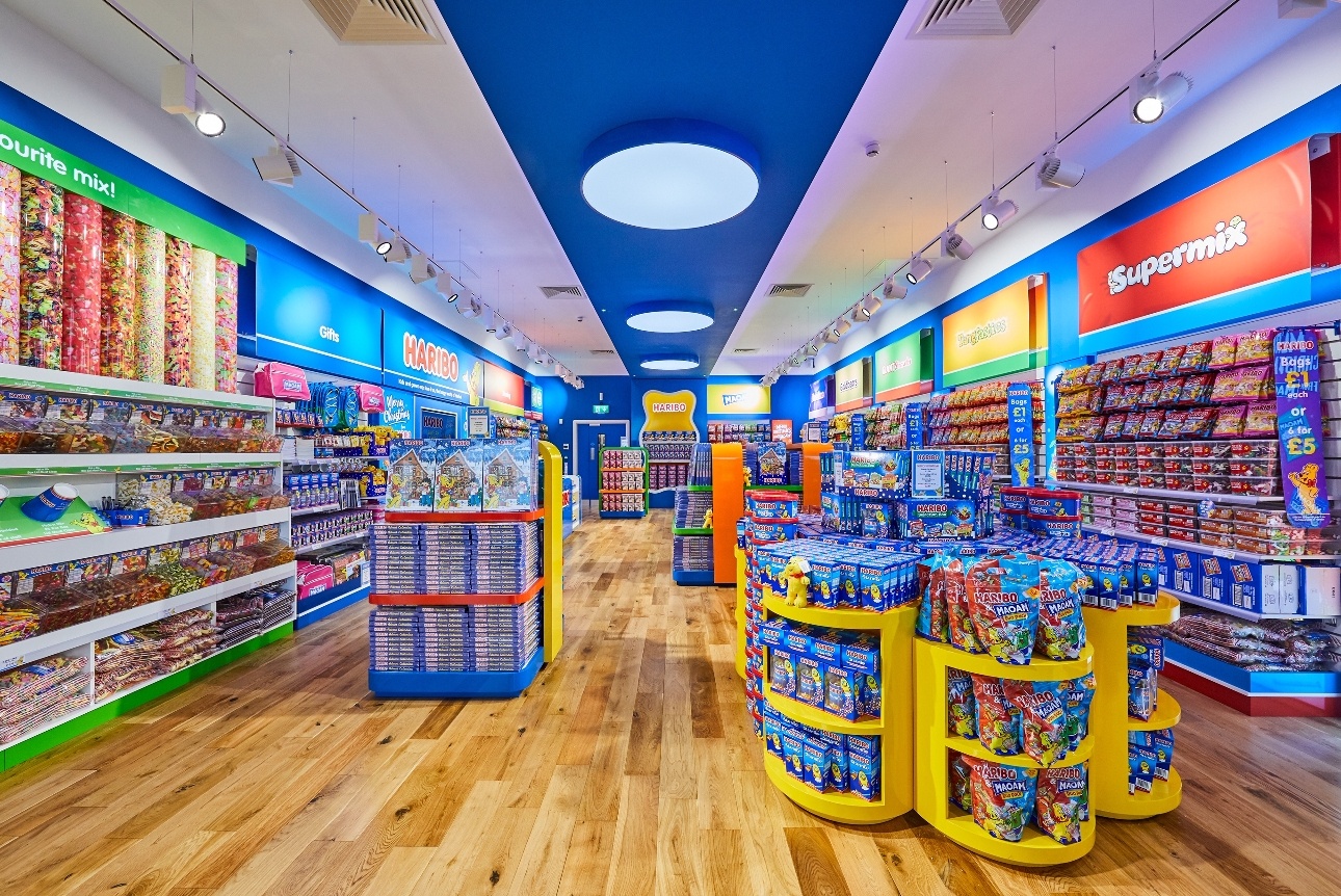 pick 'n' mix shop with sweets on the walls and down the aisles