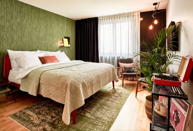 Hotel bedroom with vinyl player