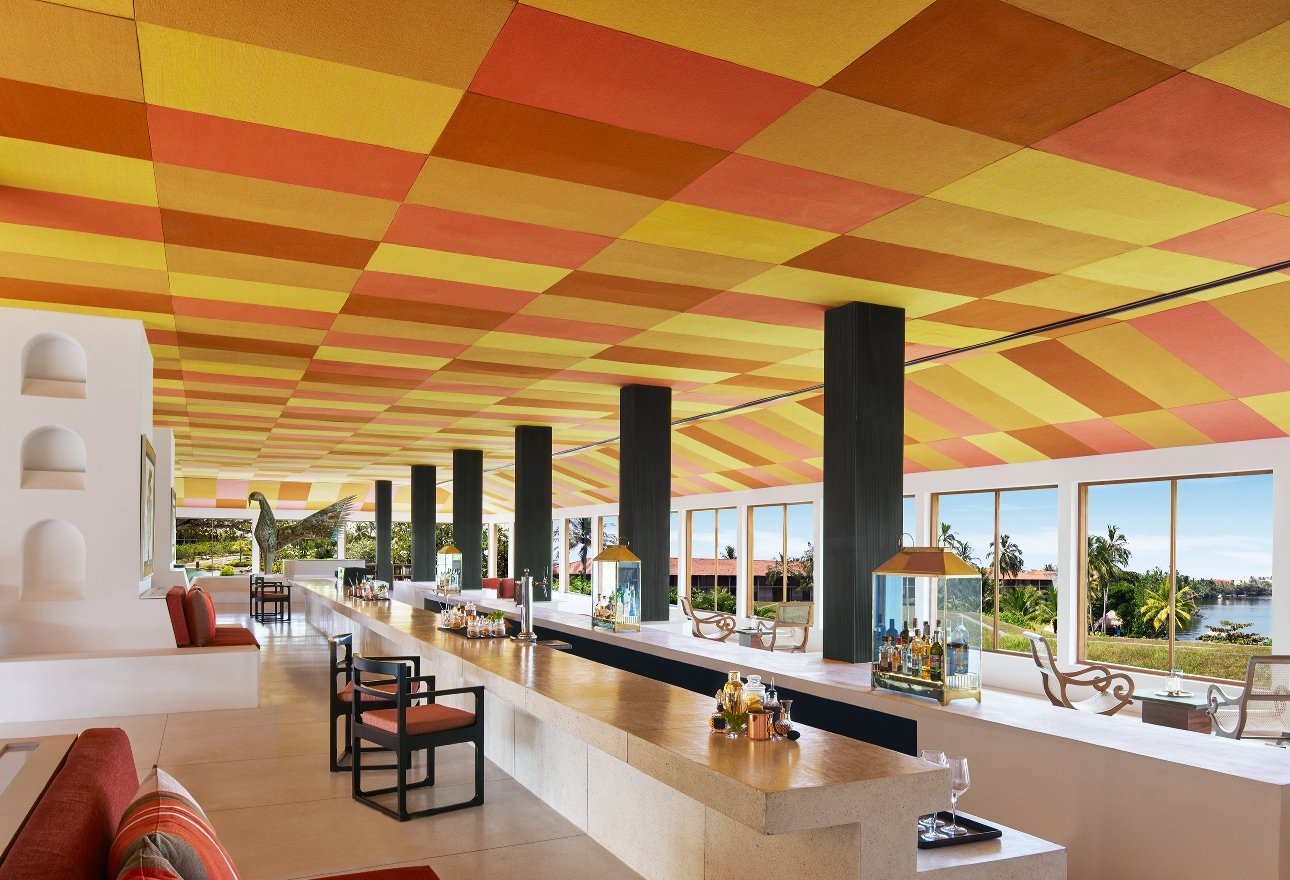 restaurant with coloured ceiling with sea view