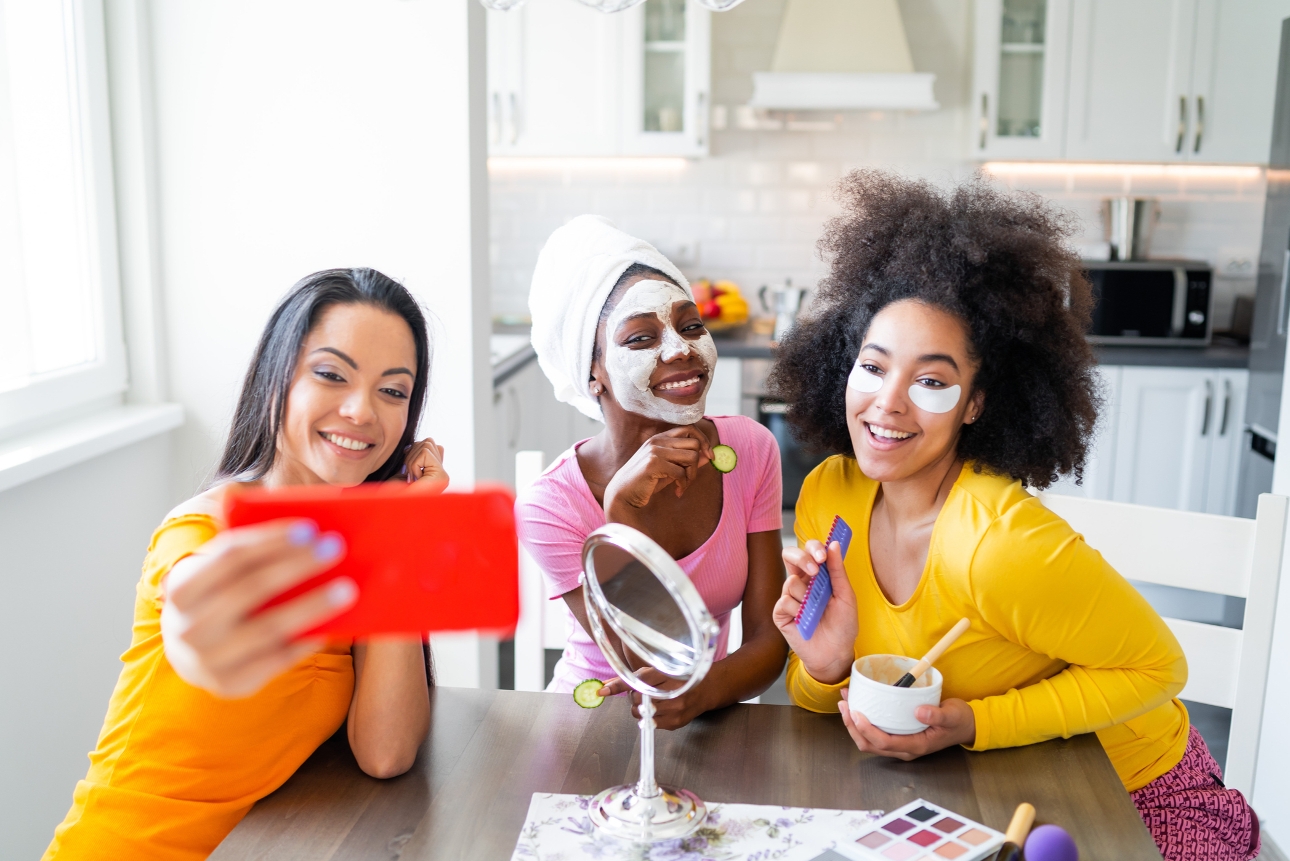 women at home doing spa treatments and make-up