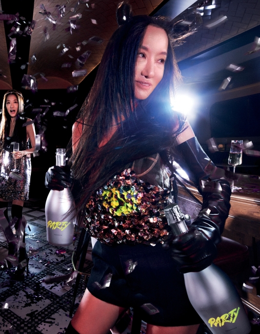 Model holding a Vera Wang PARTY Prosecco bottle