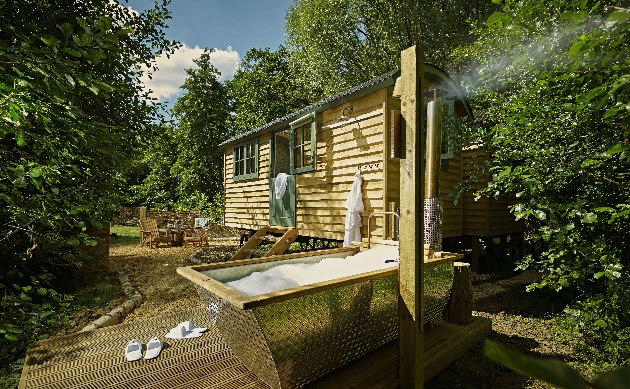 shepherds hut with outdoor bath