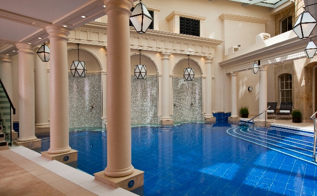 luxury spa thermal pool with grand marble pillars