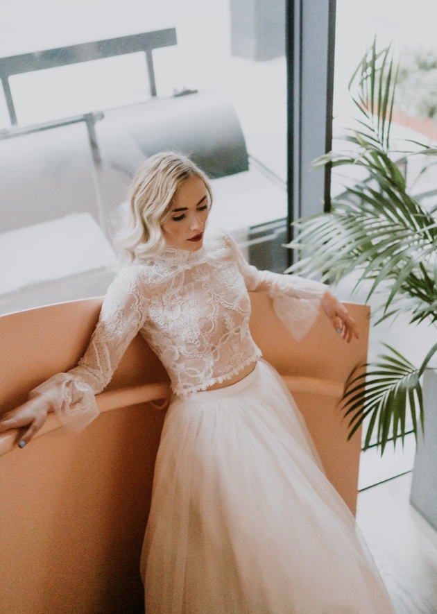 model in two piece sheer top and tulle skirt