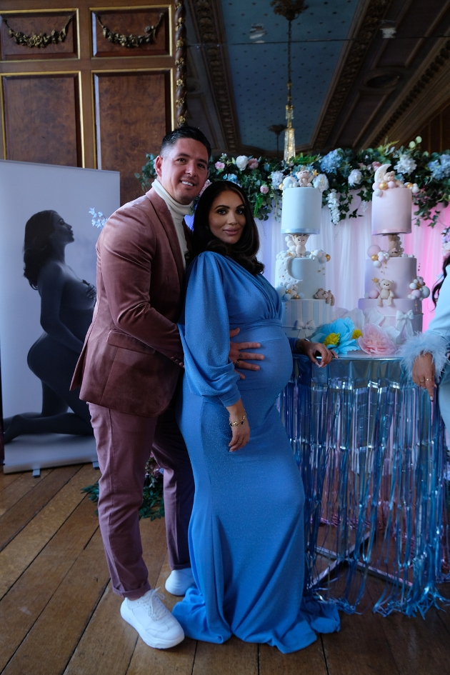 Couple standing together at baby shower