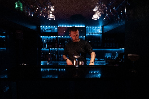 barman behind a bar 