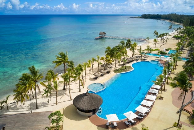 Sky view of a swimming pool and the sea