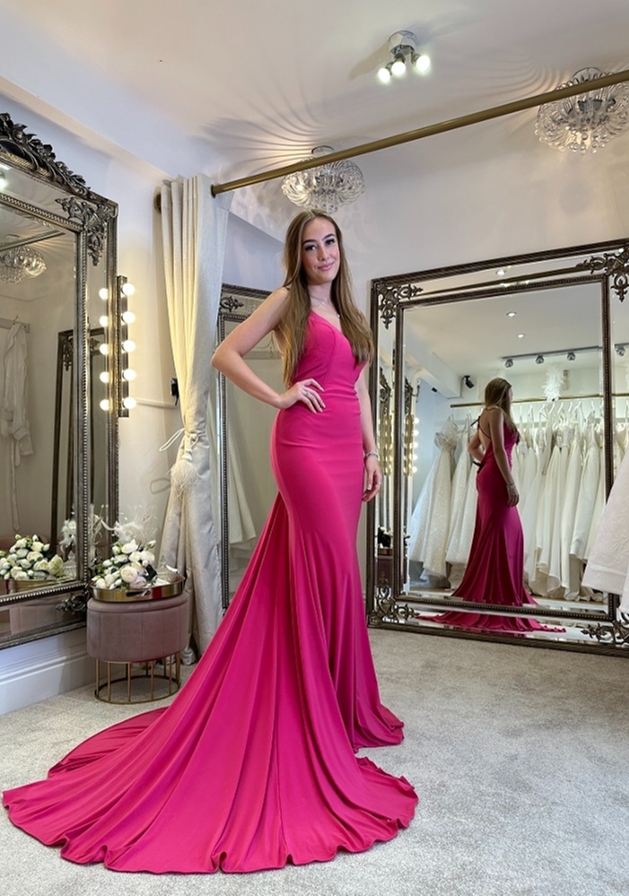 girl modelling pink full length gown