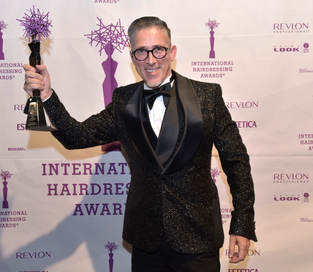 TONI&GUY stylist holding award