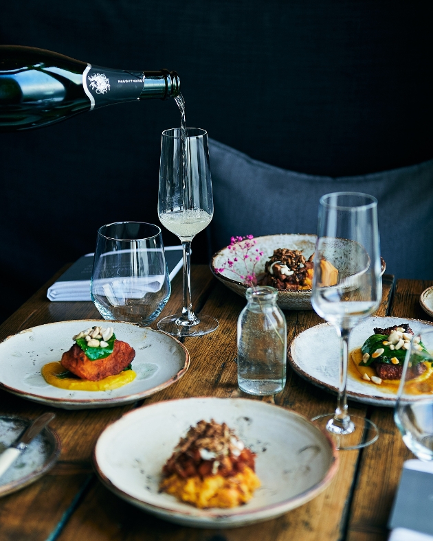 small plates of food on restaurant table