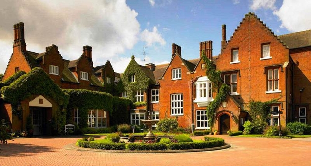 Sprowston Manor red brick ivy clad historic manor 