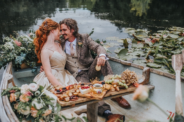 wedding couple in a rowing boat