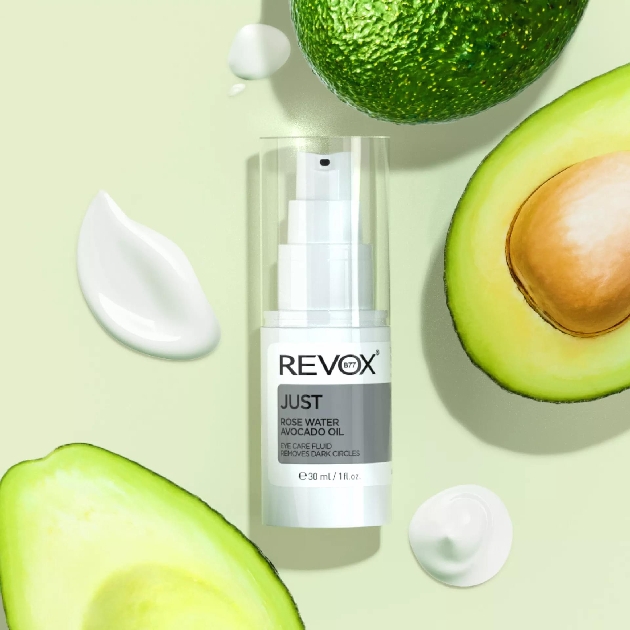 rose water beauty product next to avocado