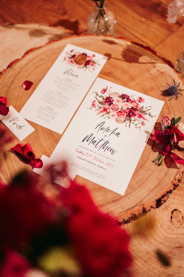 wedding invitation with red flowers