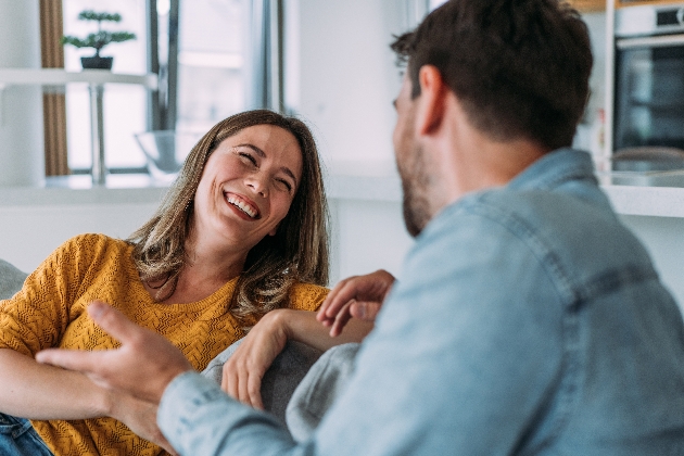 couple talking on couch