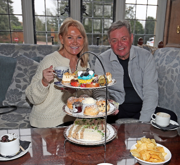 Carol and Mark Wright Senior having afternoon tea