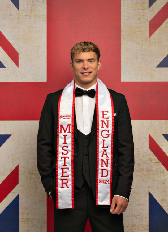 portrait of mr england winner in front of union jack flag