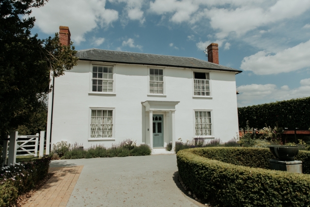 Vaulty Manor white country house