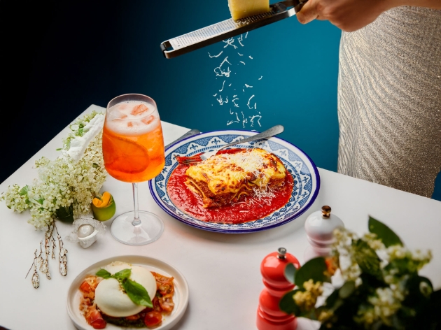plate of lasagne of restaurant table