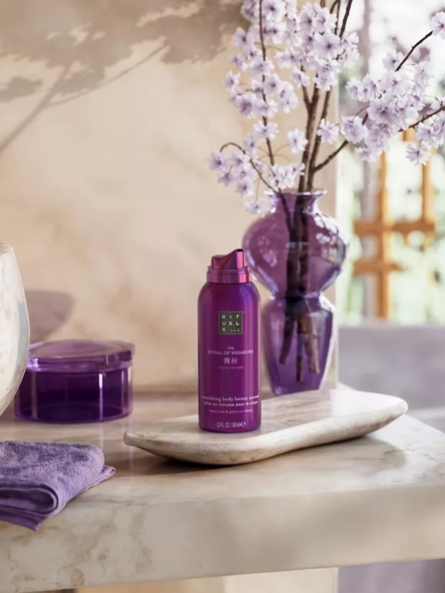 purple aerosol of body lotion