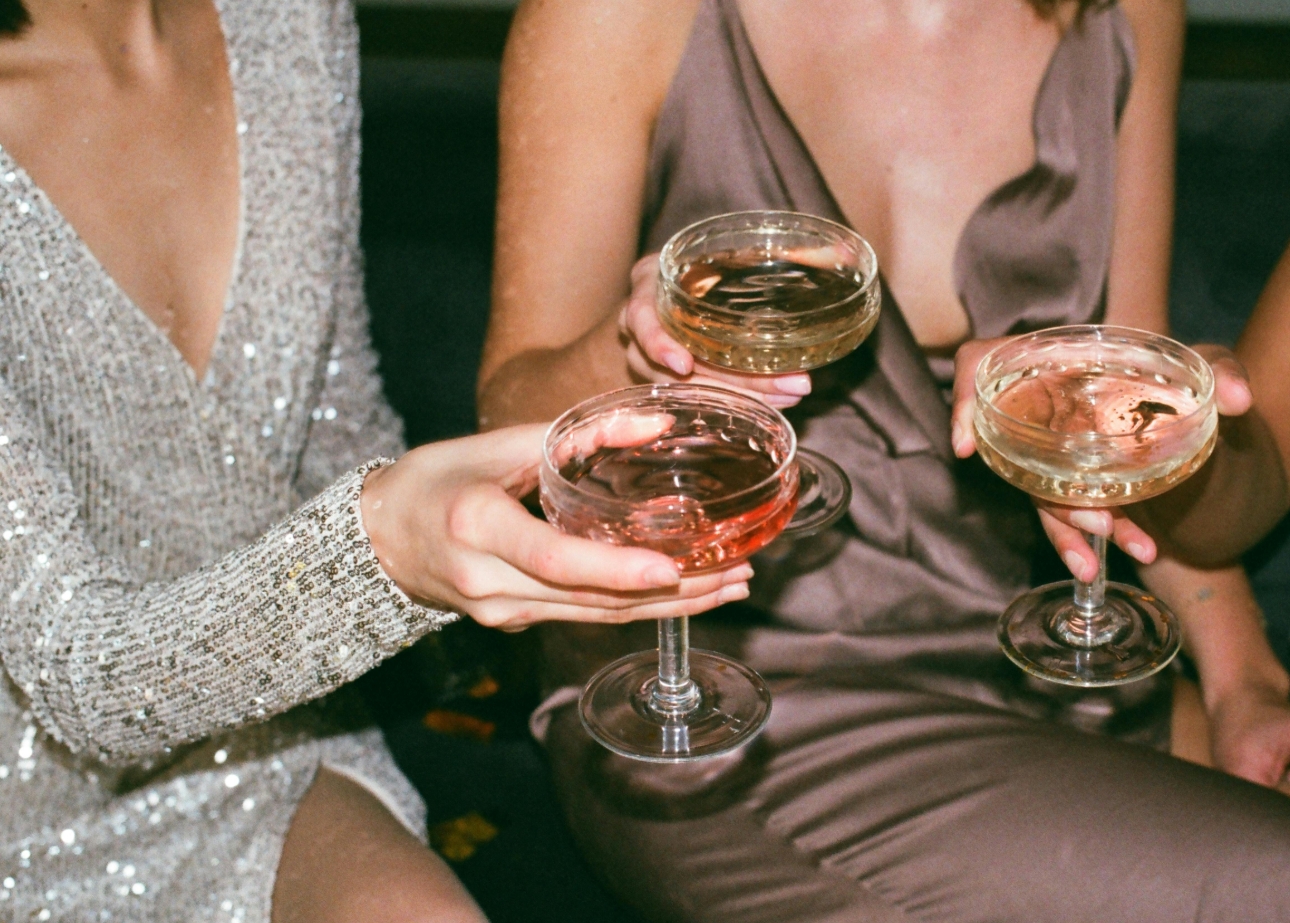 three women with drinks