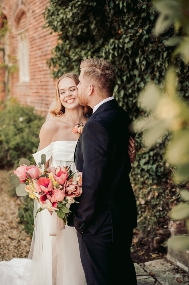 married couple outside looking at eachother