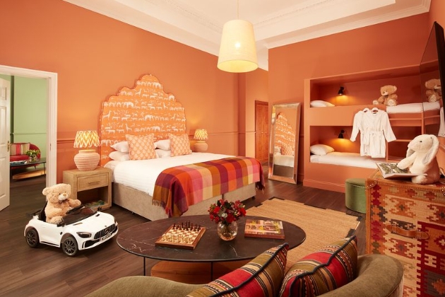 hotel room with burnt orange colour walls