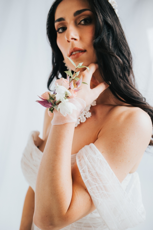 close up of brunette bride looking at camera