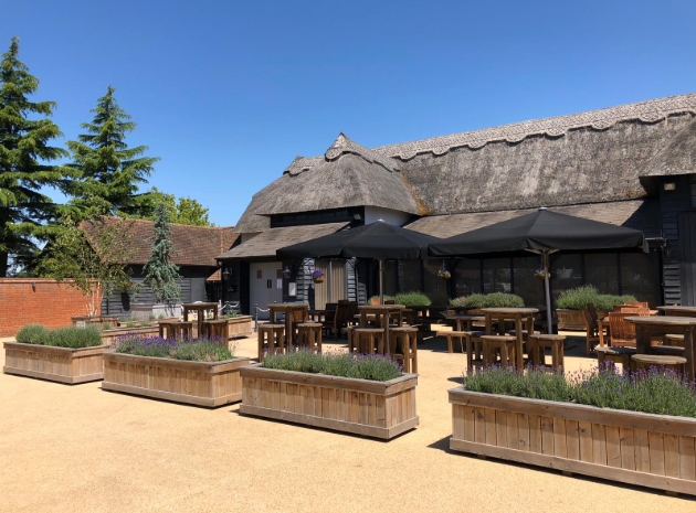 exterior of barn wedding venue on a beautiful day
