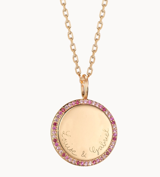 A necklace from Merci Maman's Pink October Collection