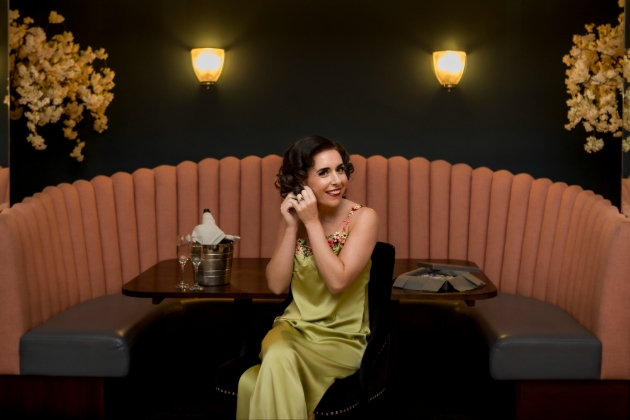 vintage styled lady wearing green dress