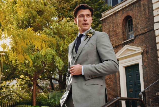 man in modern grey wedding suit
