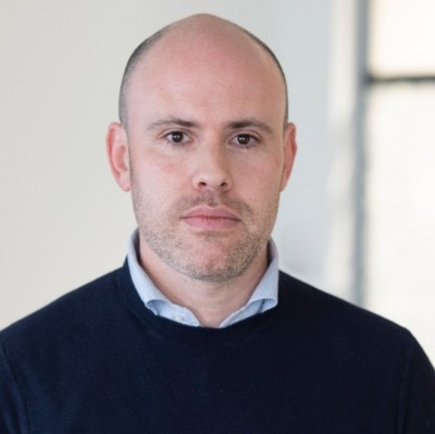 headshot of Brett Frankle