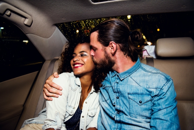 couple in back of taxi